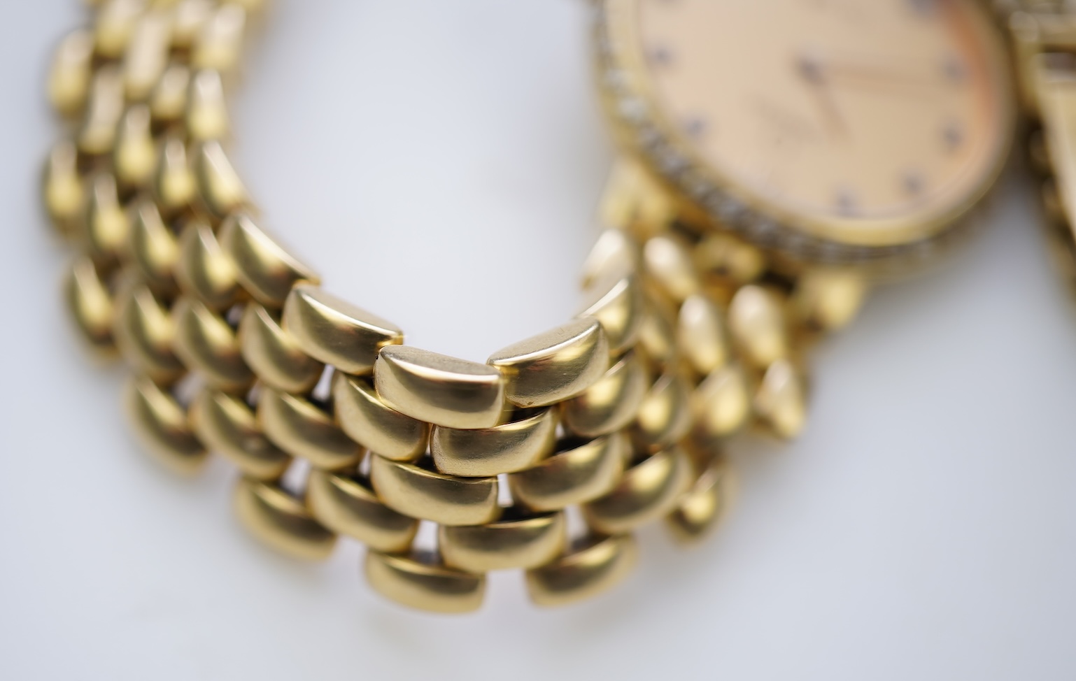 Omega, a lady's 18ct gold and diamond 'De Ville' wristwatch